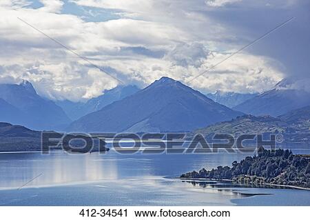 Scenic view of lake and mountains, Glenorchy, South Island New Zealand View Large Photo Image Stock Image - Scenic view of lake and mountains, Glenorchy, South Island New Zealand. Fotosearch