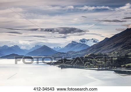 Scenic view of lake and mountains, Glenorchy, South Island New Zealand View Large Photo Image Stock Image - Scenic view of lake and mountains, Glenorchy, South Island New Zealand. Fotosearch