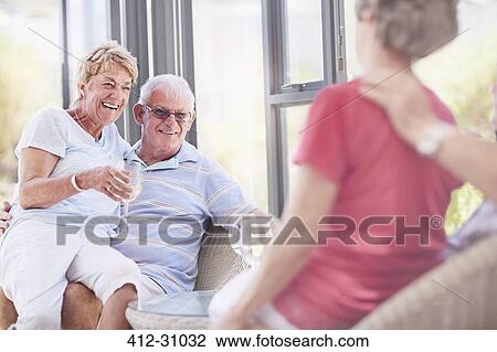 Senior couples drinking wine View Large Photo Image Stock Image - Senior couples drinking wine. Fotosearch