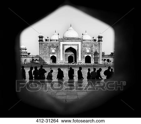 Silhouette of people facing the Taj Mahal, Agra, India View Large Photo Image Picture - Silhouette of people facing the Taj Mahal, Agra, India. Fotosearch