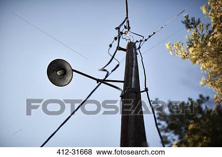 Stock Photo - Street light and telephone pole. Fotosearch