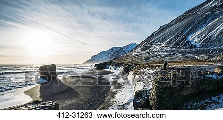 Sun shining over icy beach and mountains, Iceland View Large Photo Image Stock Image - Sun shining over icy beach and mountains, Iceland. Fotosearch