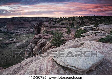 Stock Photography - Sunrise over Canyon de Chelly, New Mexico, United States. Fotosearch