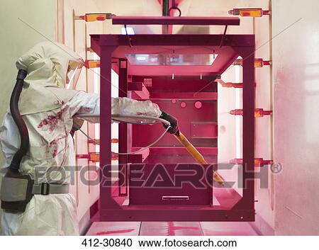 Worker painting steel red in steel factory View Large Photo Image Stock Image - Worker painting steel red in steel factory. Fotosearch