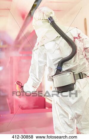 Worker painting steel red in steel factory View Large Photo Image Stock Photo - Worker painting steel red in steel factory. Fotosearch