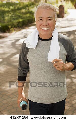 Older man smiling during workout View Large Photo Image Picture - Older man smiling during workout. Fotosearch