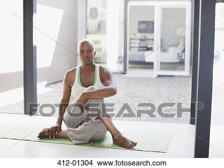 Older woman stretching on yoga mat View Large Photo Image Picture - Older woman stretching on yoga mat. Fotosearch