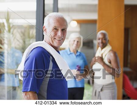 Smiling older man wearing towel View Large Photo Image Picture - Smiling older man wearing towel. Fotosearch