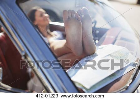 Close up of woman's dirty feet on dashboar View Large Photo Image Stock Image - Close up of woman's dirty feet on dashboar. Fotosearch
