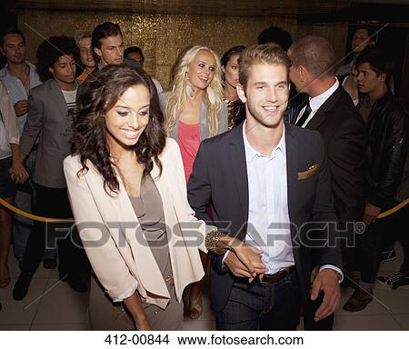 Picture - Couple granted access at nightclub. Fotosearch