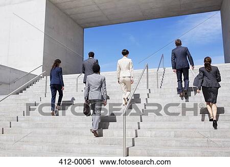 Business people ascending urban stairs View Large Photo Image Stock Image - Business people ascending urban stairs. Fotosearch