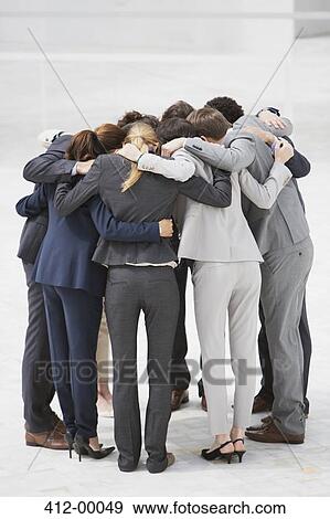 Business people in huddle View Large Photo Image Stock Photo - Business people in huddle. Fotosearch