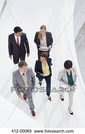 Stock Photography - Business people walking. Fotosearch