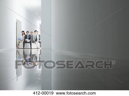 Portrait of business people sitting in circle in corridor View Large Photo Image Stock Photo - Portrait of business people sitting in circle in corridor. Fotosearch