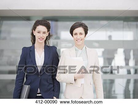 Stock Image - Portrait of smiling businesswoman. Fotosearch