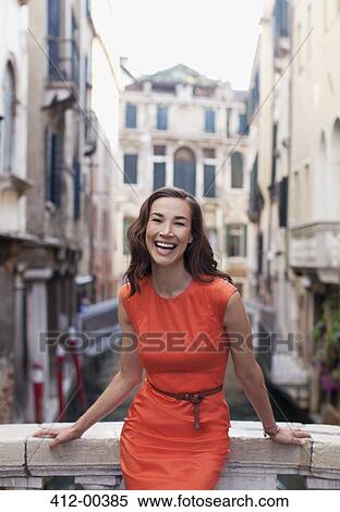 Portrait of smiling woman in Venice View Large Photo Image Stock Photography - Portrait of smiling woman in Venice. Fotosearch