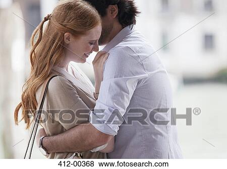 Smiling couple hugging View Large Photo Image Stock Photo - Smiling couple hugging. Fotosearch