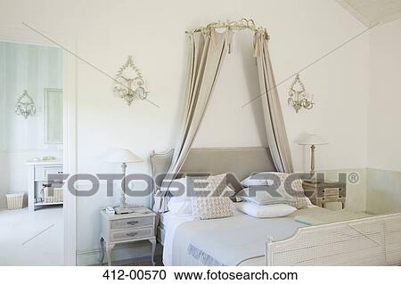 Bed with canopy in luxury bedroom View Large Photo Image Stock Image - Bed with canopy in luxury bedroom. Fotosearch