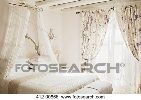 Bed with canopy in luxury bedroom View Large Photo Image Stock Photograph - Bed with canopy in luxury bedroom. Fotosearch