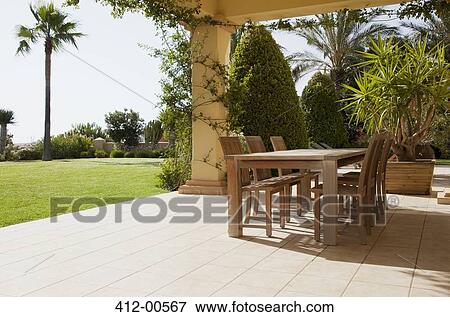 Patio with table View Large Photo Image Stock Photo - Patio with table. Fotosearch