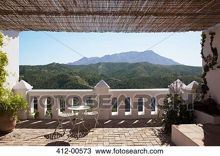 Stock Image - View of mountains from balcony. Fotosearch