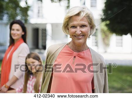 Three generations of women walking outdoors View Large Photo Image Stock Image - Three generations of women walking outdoors. Fotosearch