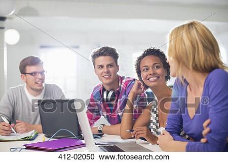 Business people talking in meeting View Large Photo Image Stock Image - Business people talking in meeting. Fotosearch