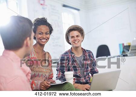 Business people talking in office View Large Photo Image Stock Image - Business people talking in office. Fotosearch