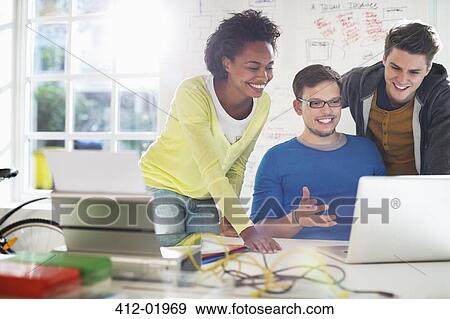 Business people working together in office View Large Photo Image Stock Photo - Business people working together in office. Fotosearch
