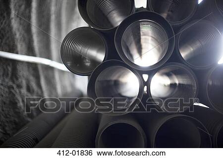 Close up of piping in tunnel View Large Photo Image Stock Photograph - Close up of piping in tunnel. Fotosearch
