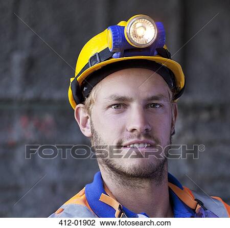 Close up of worker's smiling face View Large Photo Image Stock Image - Close up of worker's smiling face. Fotosearch