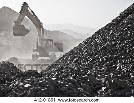 Digger working in quarry View Large Photo Image Stock Image - Digger working in quarry. Fotosearch