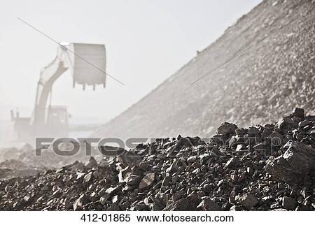 Digger working in quarry View Large Photo Image Stock Photography - Digger working in quarry. Fotosearch