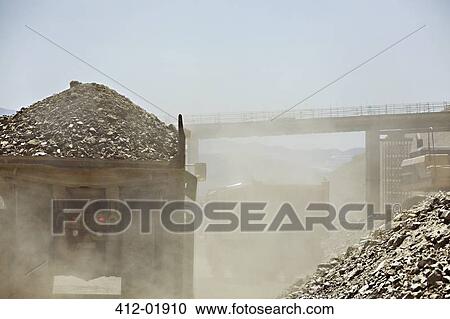 Truck carting rubble in quarry View Large Photo Image Stock Image - Truck carting rubble in quarry. Fotosearch