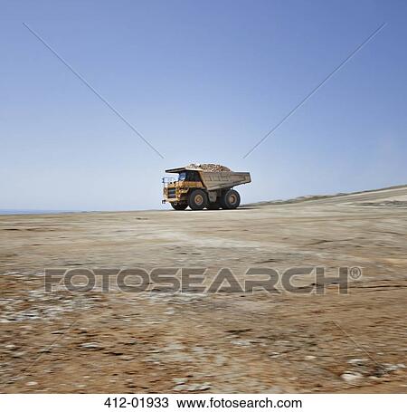 Truck driving in quarry View Large Photo Image Stock Image - Truck driving in quarry. Fotosearch