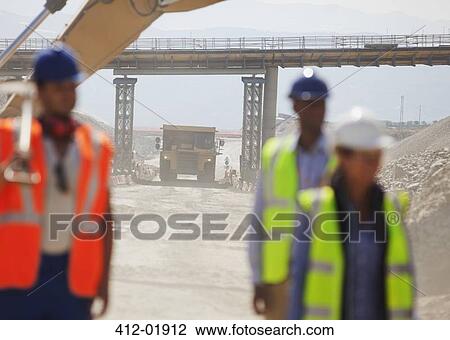 Truck driving on road in quarry View Large Photo Image Stock Image - Truck driving on road in quarry. Fotosearch