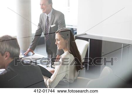 Business people talking in meeting View Large Photo Image Picture - Business people talking in meeting. Fotosearch