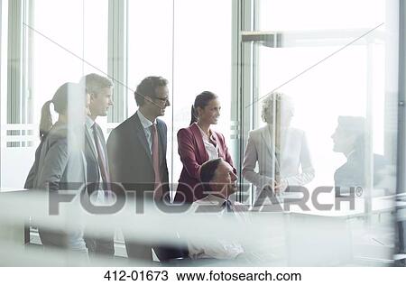 Business people talking in meeting View Large Photo Image Stock Image - Business people talking in meeting. Fotosearch