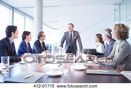 Business people talking in meeting View Large Photo Image Stock Image - Business people talking in meeting. Fotosearch