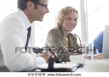 Business people talking in meeting View Large Photo Image Stock Photograph - Business people talking in meeting. Fotosearch