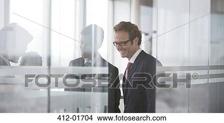 Businessmen talking in meeting View Large Photo Image Picture - Businessmen talking in meeting. Fotosearch