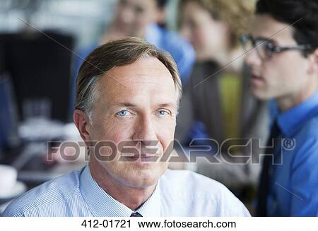 Close up of businessman's serious face View Large Photo Image Stock Image - Close up of businessman's serious face. Fotosearch