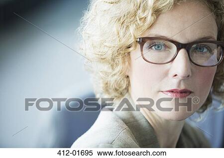 Close up of businesswoman's face View Large Photo Image Stock Photography - Close up of businesswoman's face. Fotosearch