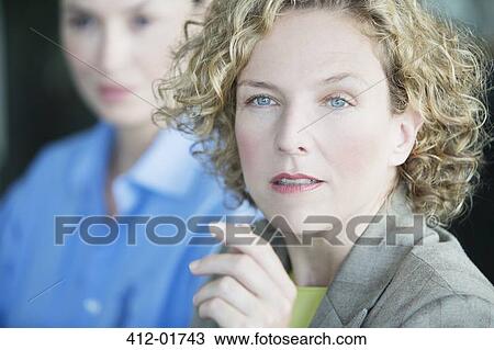 Close up of businesswoman's serious face View Large Photo Image Stock Image - Close up of businesswoman's serious face. Fotosearch