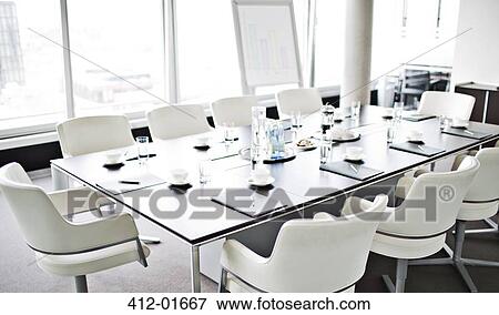 Table set for meeting in office View Large Photo Image Stock Photo - Table set for meeting in office. Fotosearch
