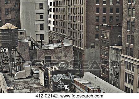 Stock Image - Urban rooftop and buildings. Fotosearch