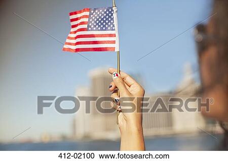 Woman with novelty nails waving American flag View Large Photo Image Stock Image - Woman with novelty nails waving American flag. Fotosearch