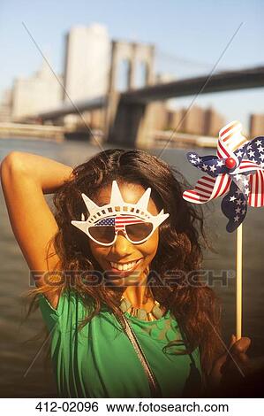 Woman with novelty sunglasses View Large Photo Image Stock Photograph - Woman with novelty sunglasses. Fotosearch