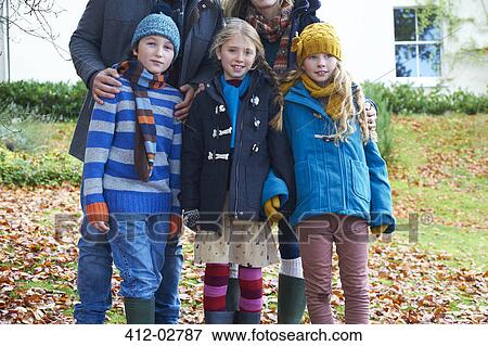 Children smiling together in autumn leaves View Large Photo Image Stock Photo - Children smiling together in autumn leaves. Fotosearch