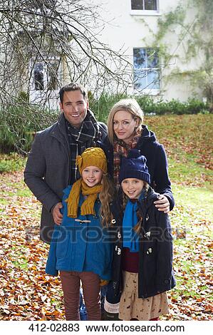 Family smiling together outdoors View Large Photo Image Stock Image - Family smiling together outdoors. Fotosearch